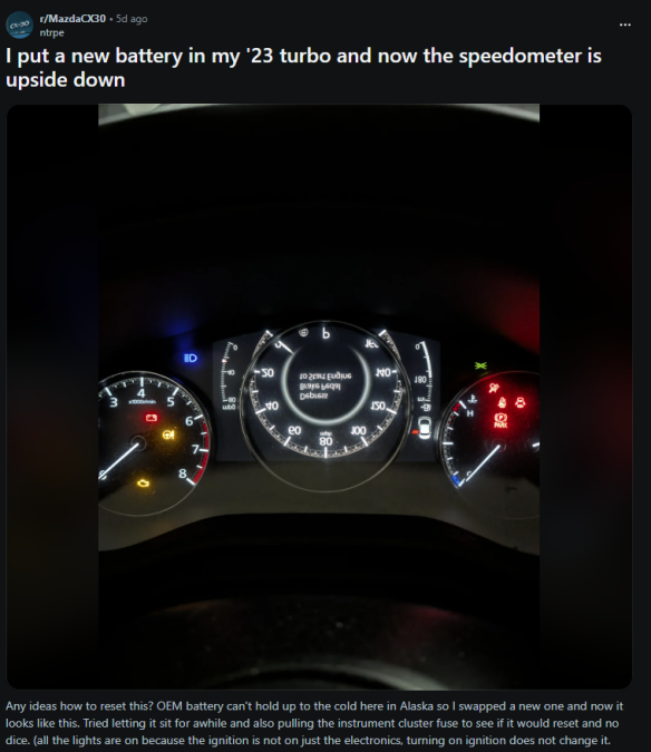 Reddit post showing upside-down speedometer and warning lights on Mazda CX-30 instrument cluster after battery replacement