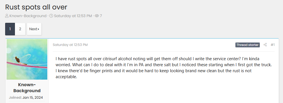 Automotive forum post discussing rust spots on Tesla Cybertruck stainless steel exterior