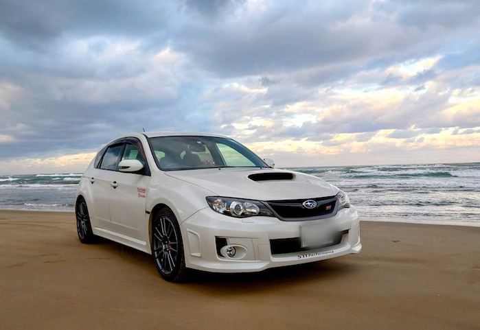 Subaru WRX hatch on the beach