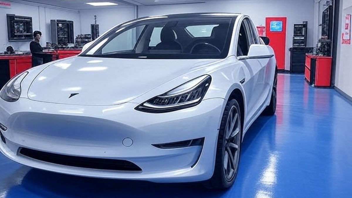 Tesla Model 3 undergoing repair at a Tesla Service Center