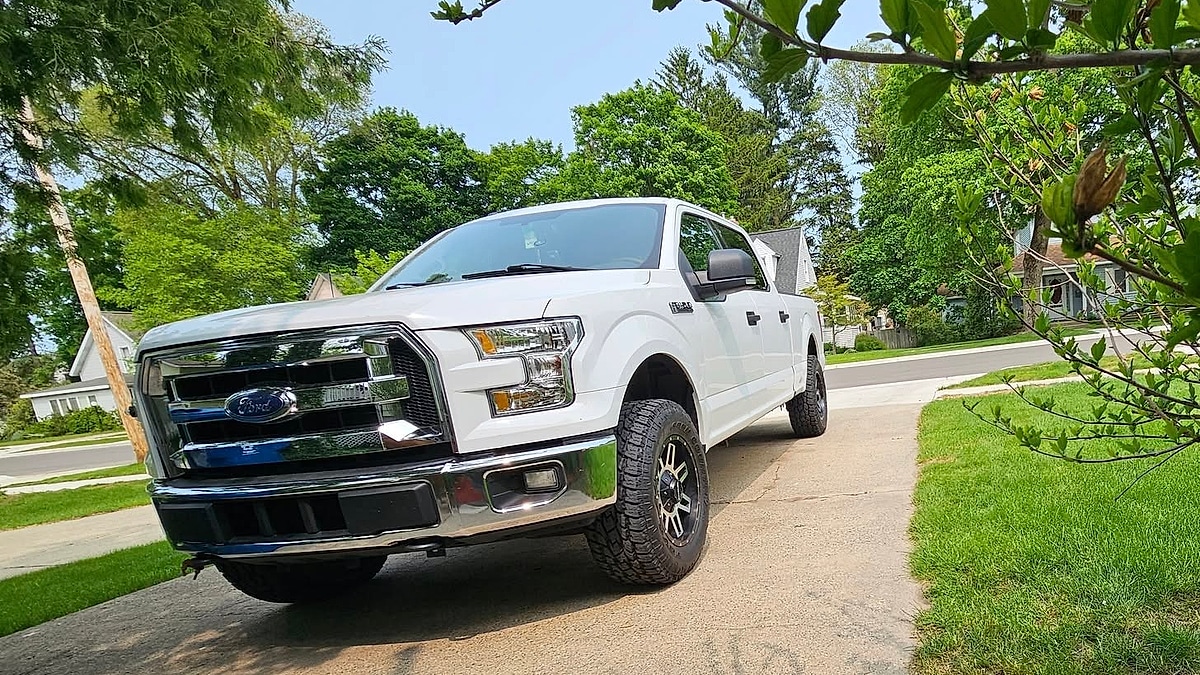 The front view of Al Pipers Ford F-150 with 200,000 miles parked in his driveway