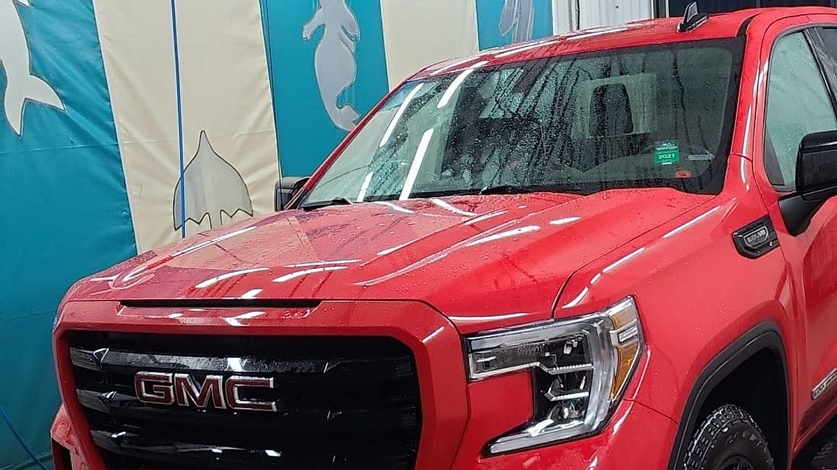 The front view of Robert Blowatt's red 2024 Chevy Silverado Trail Boss in Canada