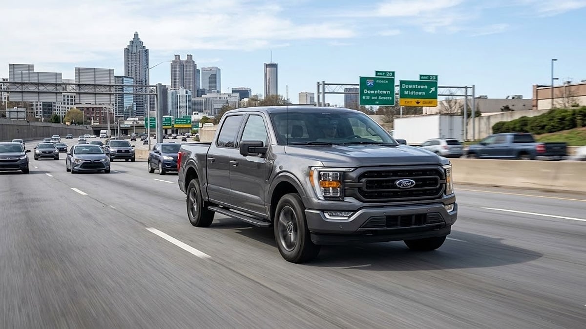 A 2025 Ford F-150 5.0L V8 travels smoothly along an Atlanta highway, proving the durability of rapid, long-distance driving