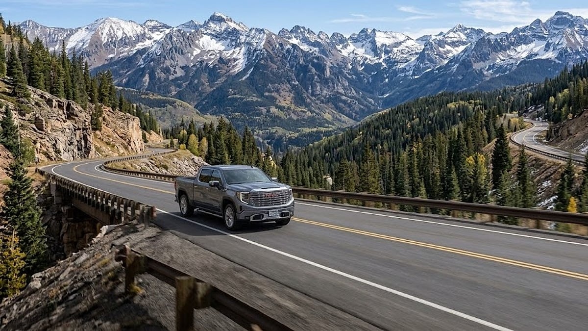A 2026 GMC Sierra Duramax travels through the high Colorado mountains, navigating winding roads and vast valleys
