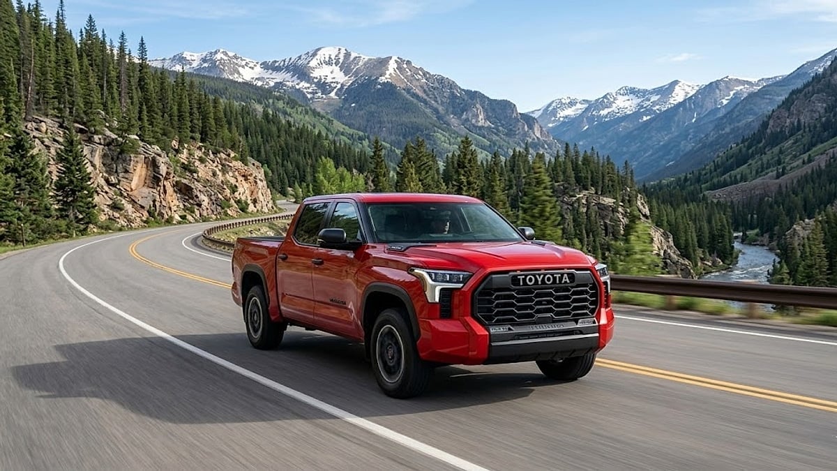 A 2026 Toyota-Tundra navigates a winding mountain pass, showcasing its power against a Colorado backdrop