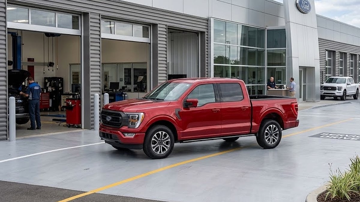 A showroom-ready 2026 Ford F-150 sits on a modern dealership service drive awaiting technical diagnostic testing for 10R80 transmission failure