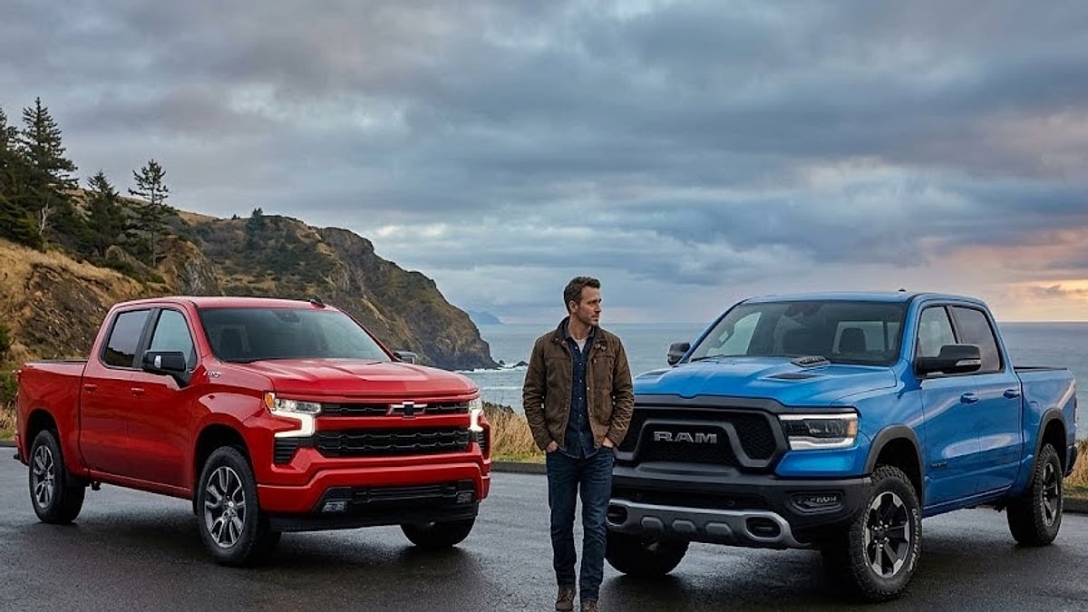 A truck owner carefully evaluates a red Chevy Silverado and blue 2026 Ram Rebel following a staggering $15,000 price cut