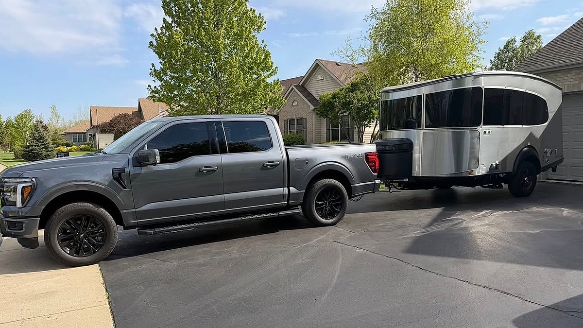 Brian R. Luedke's 2026 Ford F-150 pulling an Airstream Basecamp 20x travel trailer side view