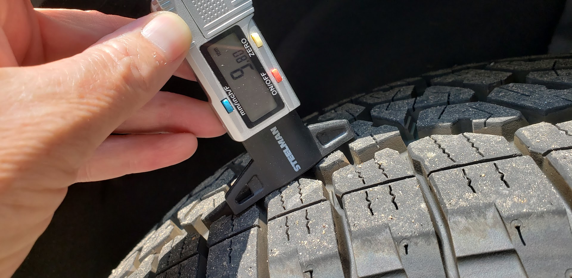 Image of tire gauge in use by John Goreham