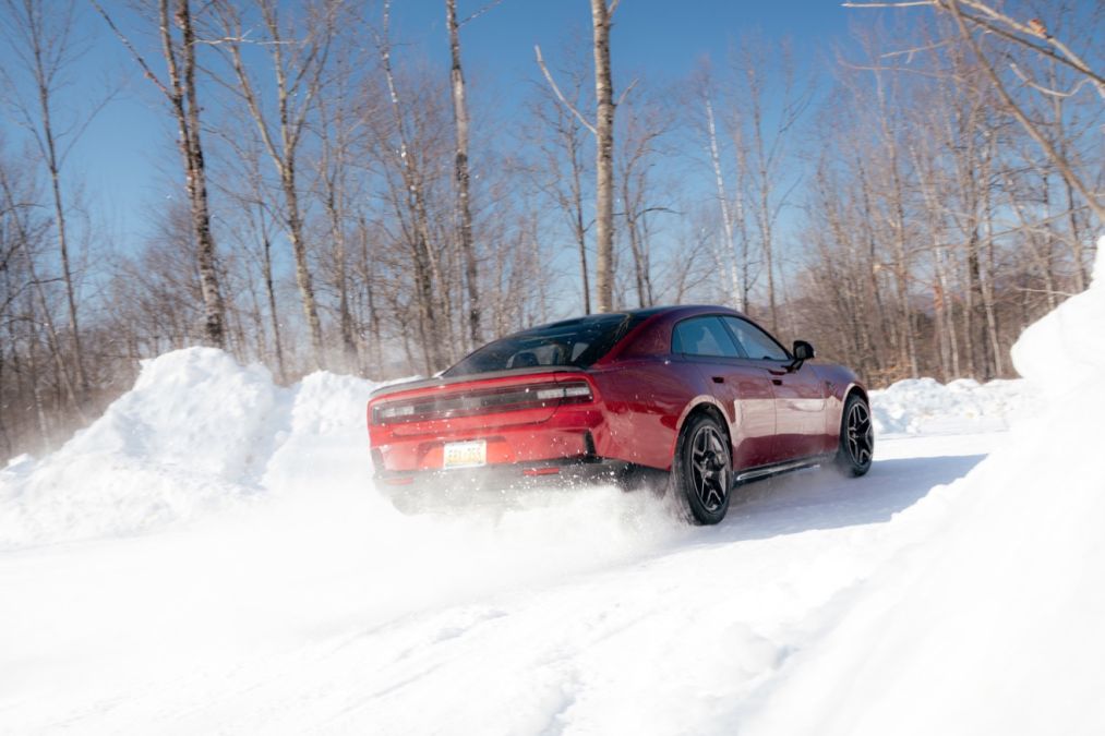 A Dodge Charger rallies in the snow