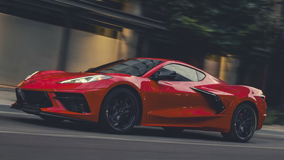 Chevrolet Corvette C8 driving on open road performance shot