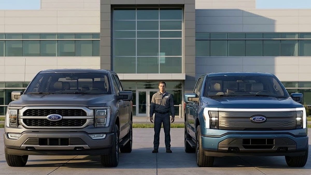 Compact Ford electric pickup truck parked next to a Ford F-150