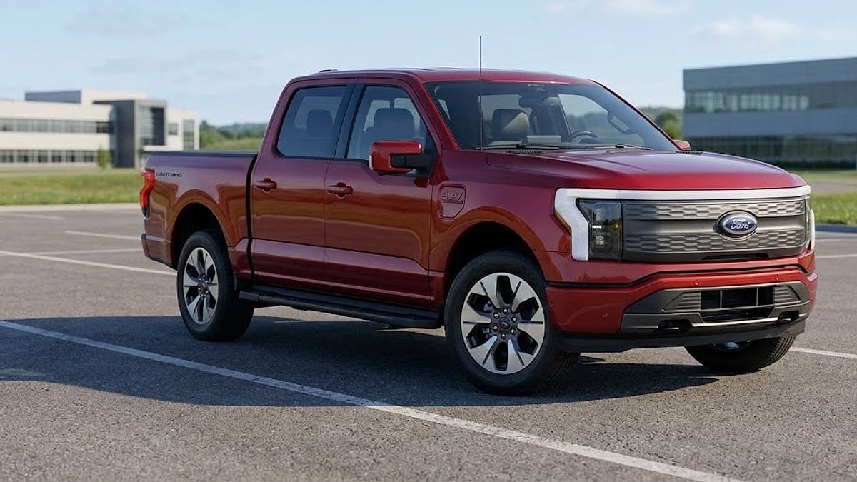 Compact Ford electric pickup truck parked on the manufacturer's lot
