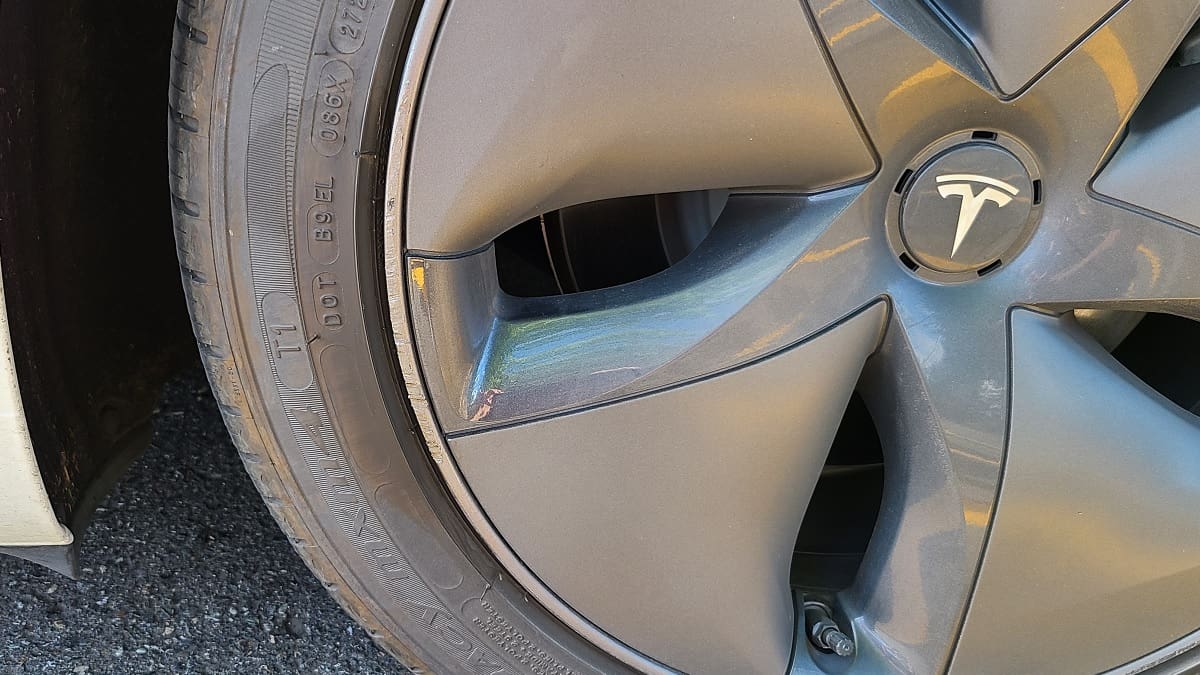 Tesla rim touched up with Dupli-Color touchup paint