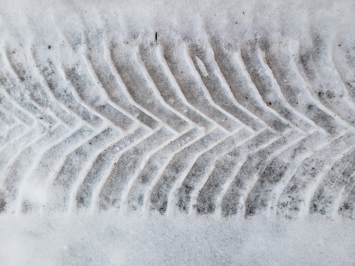 Image of tire tread in snow by John Goreham