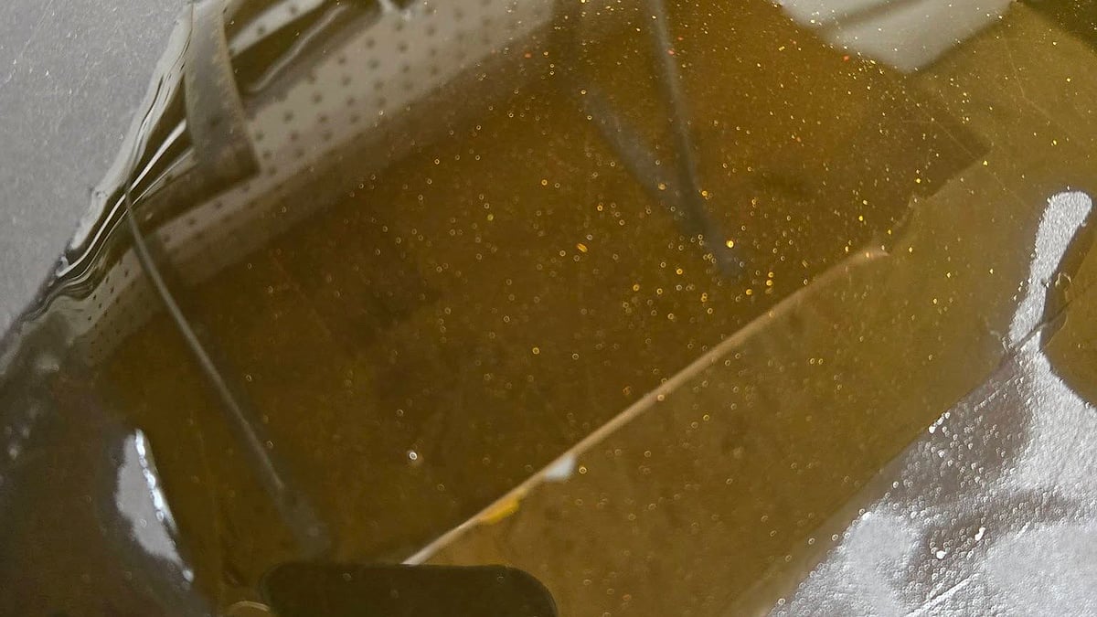 Dennis Lenius' 2026 Toyota Tundra oil pan showing the metal particles in the bottom of the oil pan