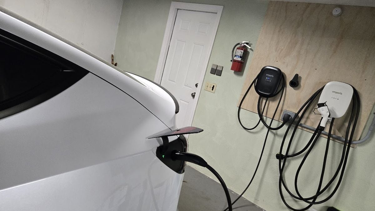 Image shows a Tesla Model Y charging using an Emporia EV charger