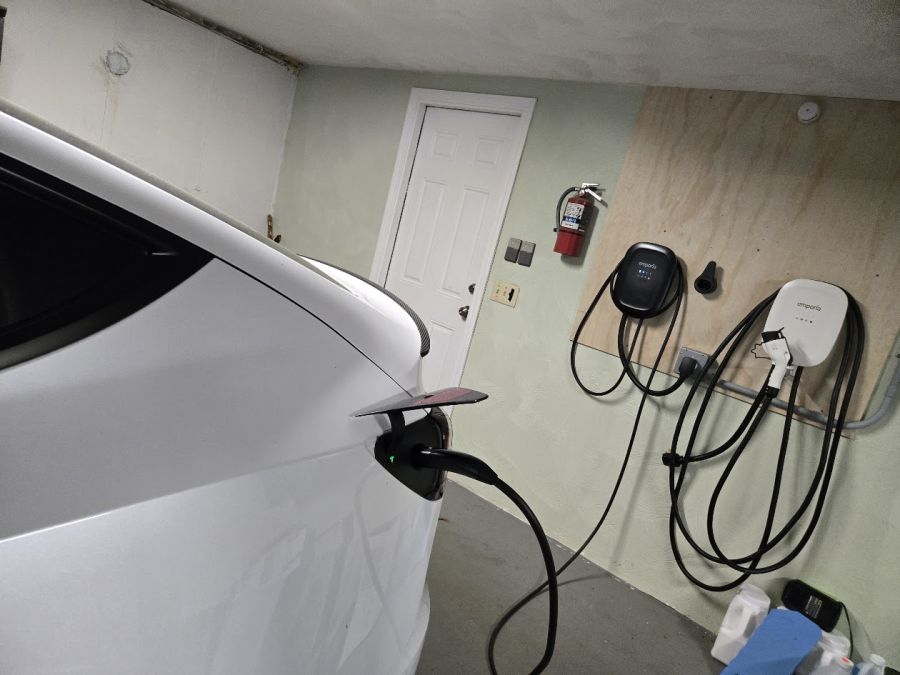 A Tesla Model Y charges in a home