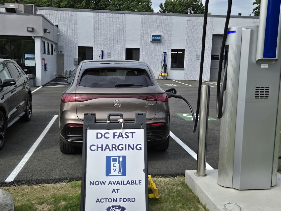 A Mercedes Benz charges at a DC charger