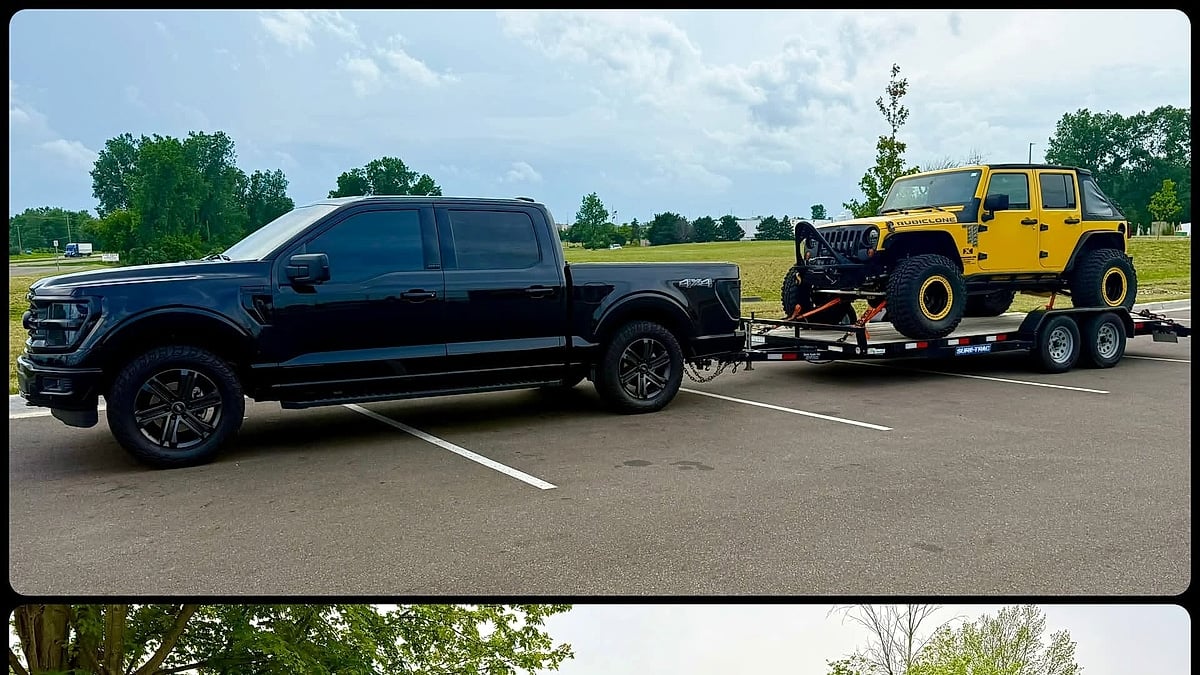 Ford F-150 pickup shown towing a yellow Jeep Wrangler on a flatbed trailer