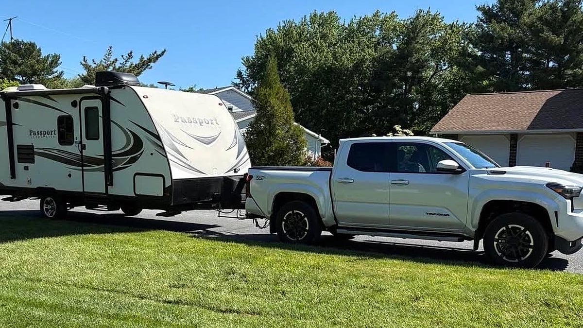 Guy Edwards' 2025 Toyota Tacoma TRD Sport pulling a travel trailer