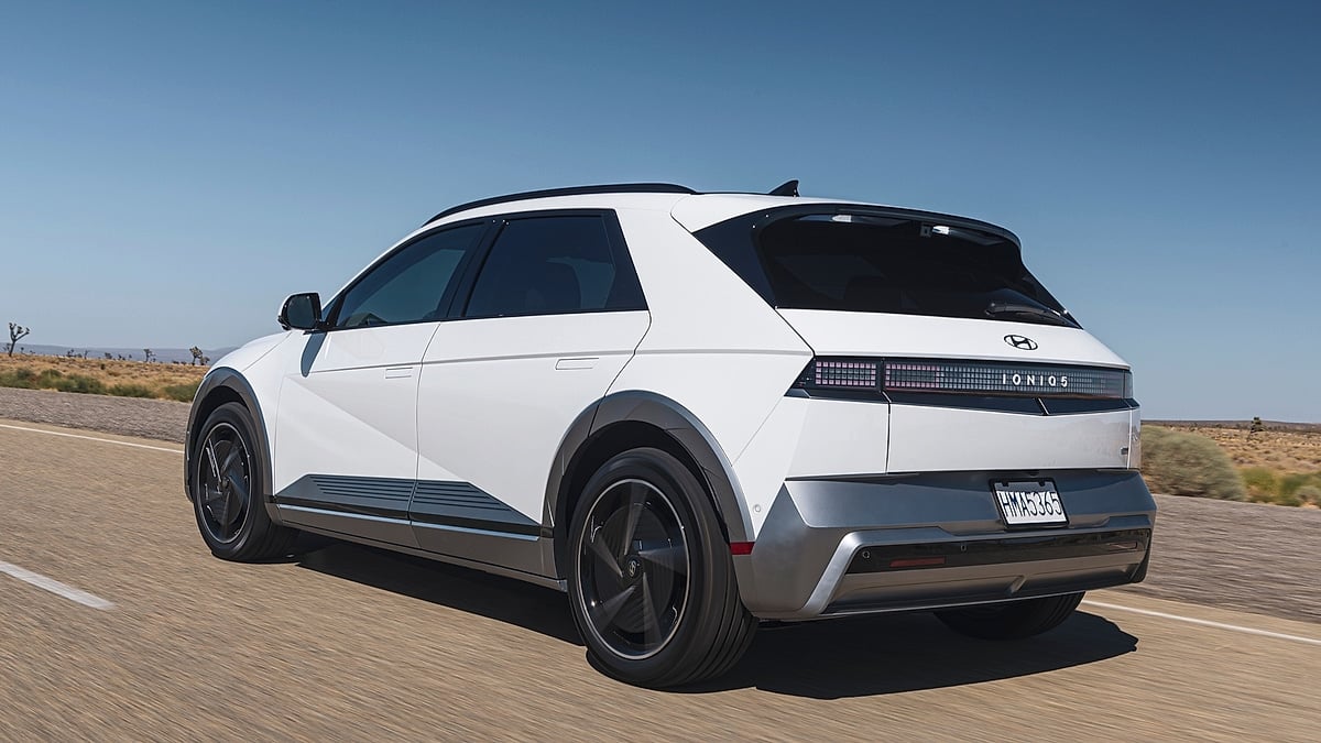 Hyundai Ioniq 5 rear view driving on desert road