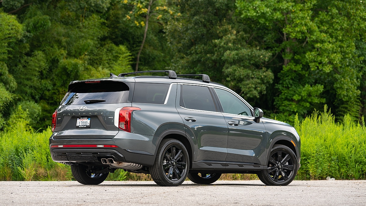 Gray Hyundai Palisade XRT SUV parked outdoors showing rear three-quarter view.