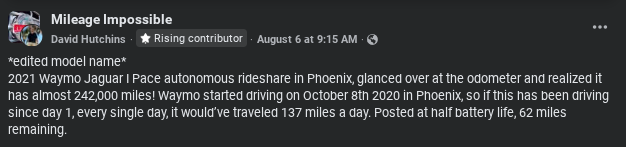 A Waymo Jaguar I-Pace rideshare vehicle in Phoenix shows an odometer reading nearly at 242,000 miles, with half battery life remaining.