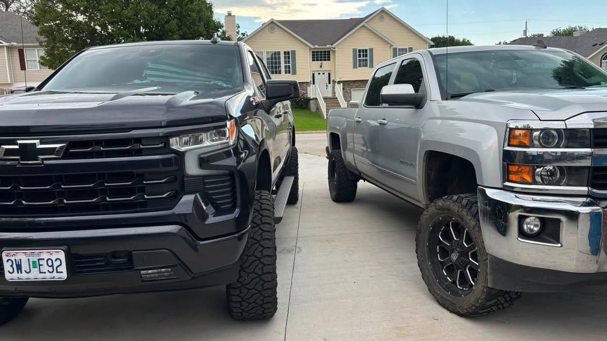 Lupe Herrera Jr.'s Chevy Silverado 2500 parked next to his Chevy Silverado 1500