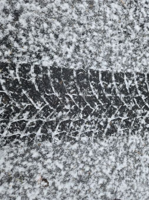 Michelin X-ICE Snow SUV tire tread impression on snow
