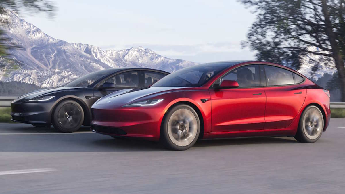Two Tesla Model 3 vehicles parked next to each other