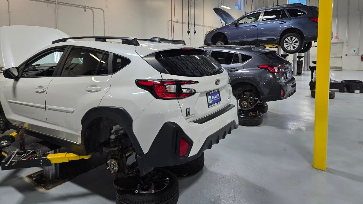 Subarus at a dealer are serviced