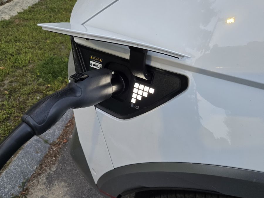 NACS to J=Plug adapter plugged into a Hyundai Ioniq 5