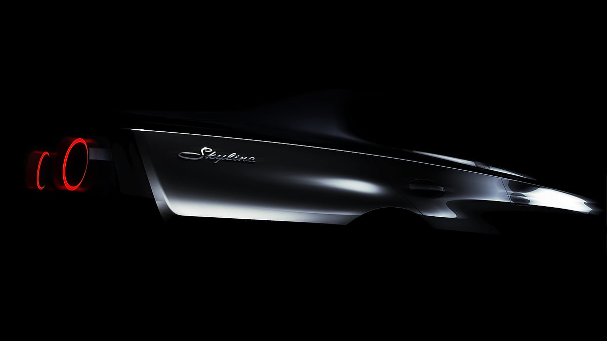 Dark teaser image of new Nissan Skyline concept showing side profile with circular red taillights and Skyline script badge against black background