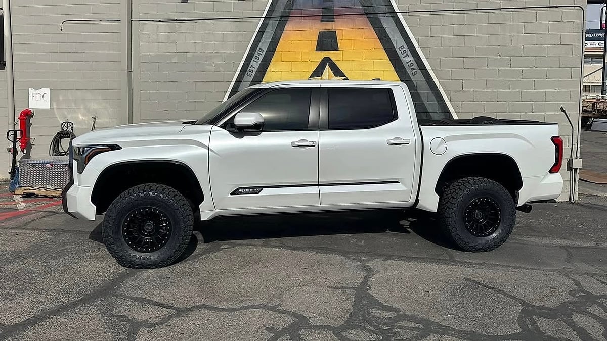 Raymond Guzman's 2024 Toyota Tundra Platinum parked in a Texas dealer's lot side view