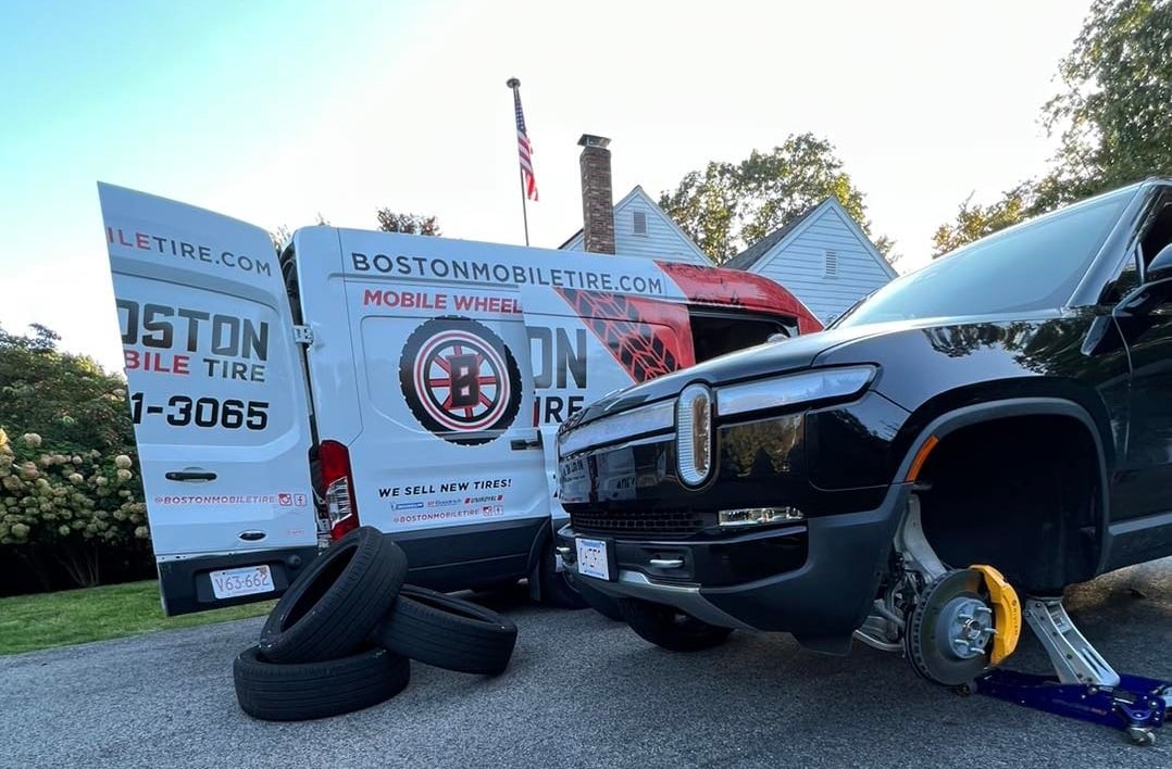 Image of Rivian getting new tires courtesy of Boston Mobile Tire