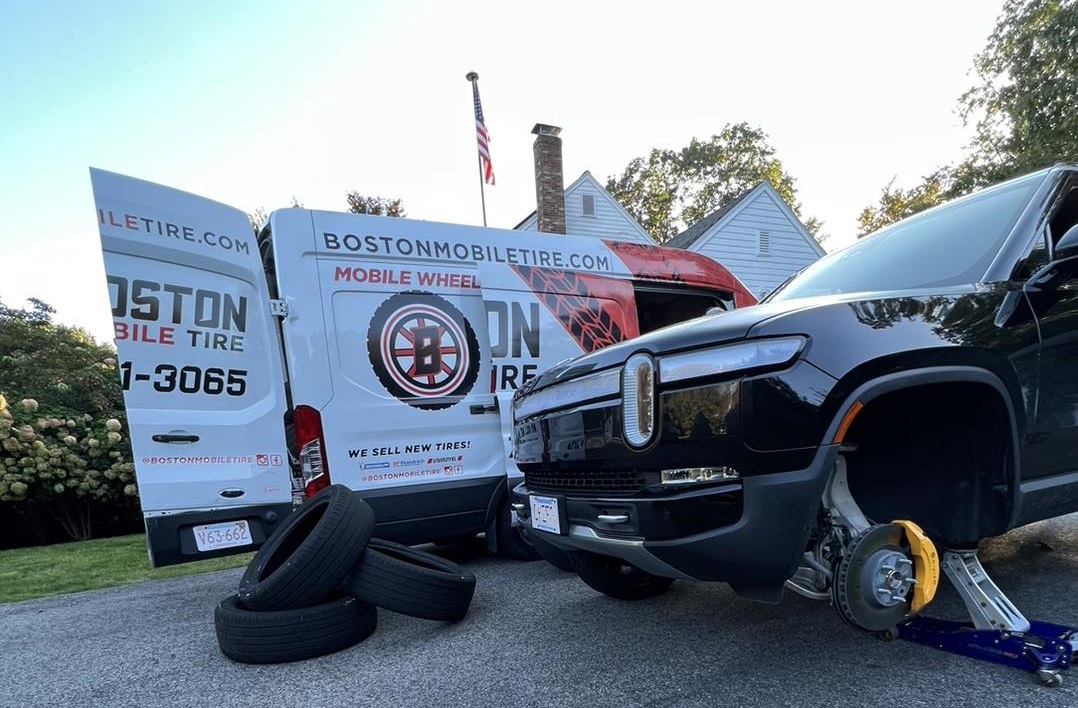 Image of Rivian getting new tires courtesy of Boston Mobile Tire