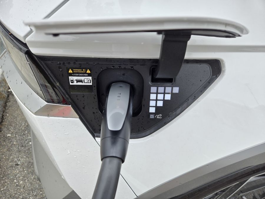 Hyundai Ioniq 5 Limited charging at a Tesla Supercharger