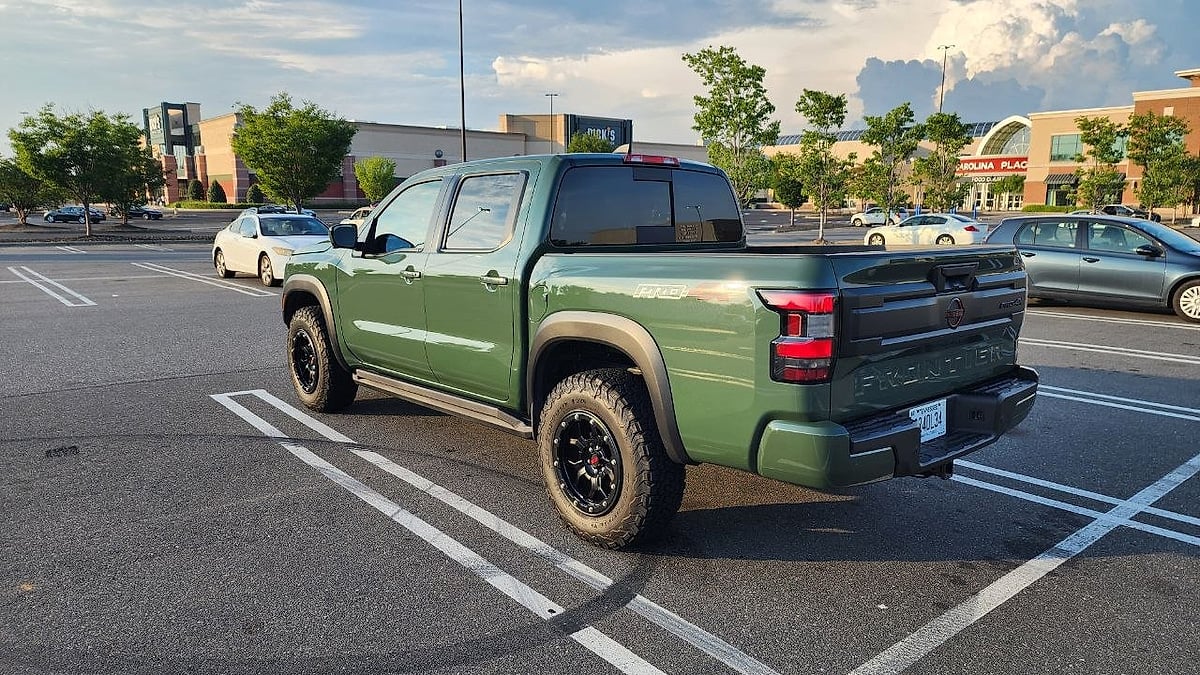 The 2026 Nissan Frontier Crew Cab PRO-4X full exterior look from behind the truck