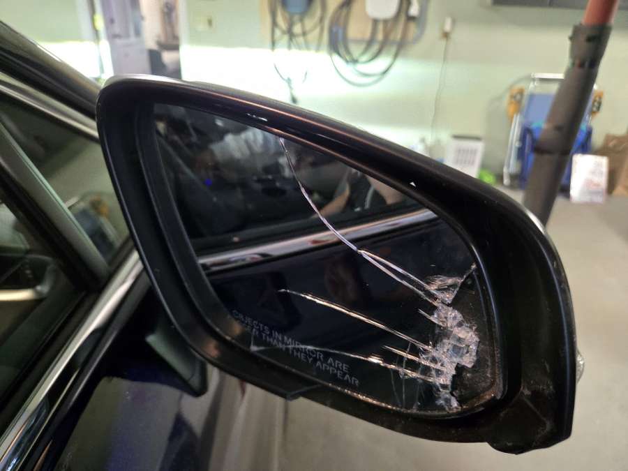 A damaged Toyota hybrid mirror