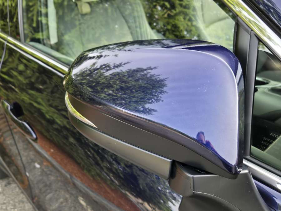 A painted Toyota hybrid mirror cap