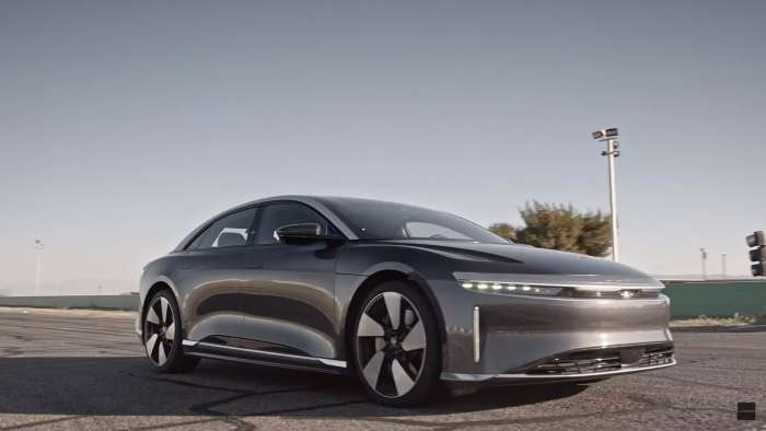 A grey Lucid Air Grand Touring Performance is pictured parked on a racetrack.