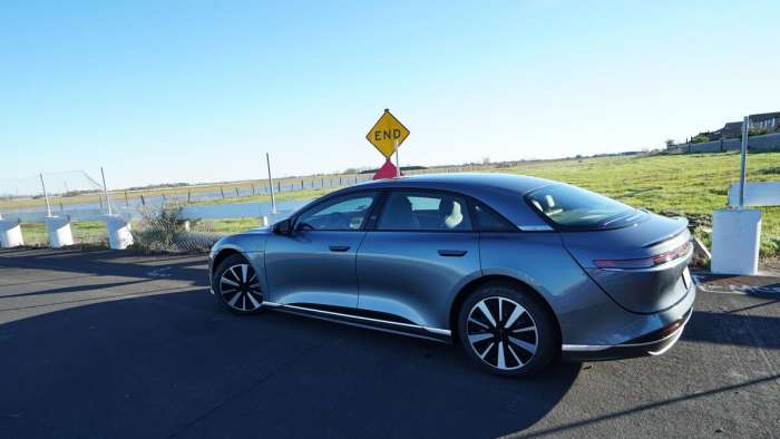 Rear view of a Lucid Air Pure painted in Fathom Blue.