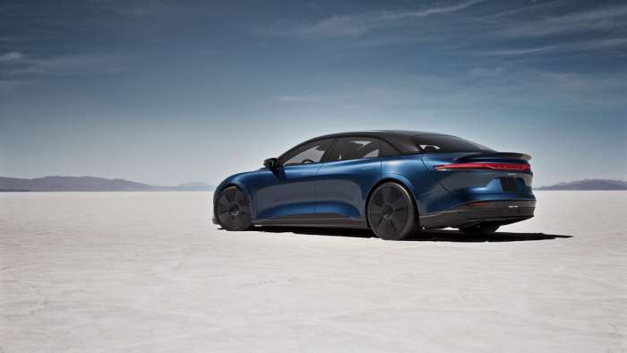 Image showing the new Lucid Air Sapphire with blue paint and black carbon fiber wheel covers.