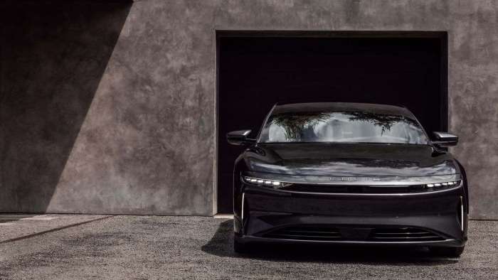 Front view of a black Lucid Air Stealth Look showing its altered headlight surround.