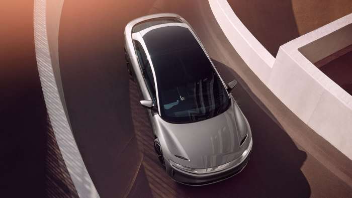 Image of the Lucid Air Touring as seen from above with its glass roof stretching to the back of the passenger cabin.