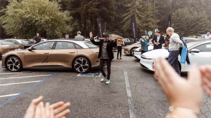 Excited customers cheer at the end of the 2021 Lucid Rally.