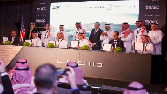Image showing Lucid and Saudi officials gathered for the signing ceremony.