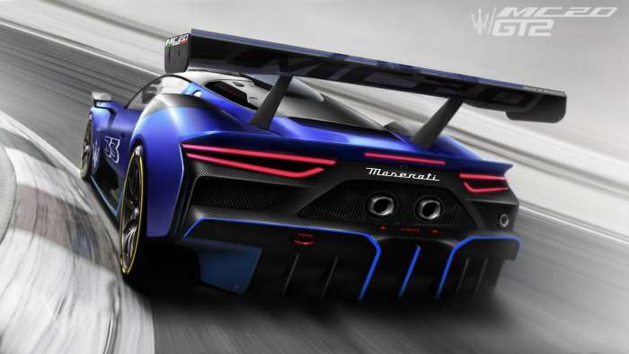 Rear view of the Maserati MC20 GT2 showing its huge rear wing and diffuser painted blue on black to resemble the brand's trident logo.