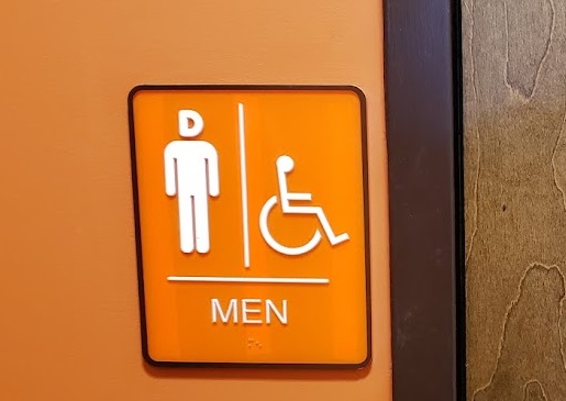 Image of restroom sign by John Goreham